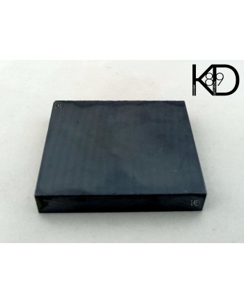 Pierre de touche synthétique