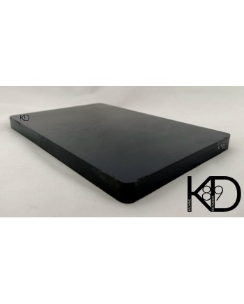 Pierre de touche synthétique