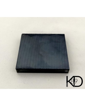 Pierre de touche synthétique